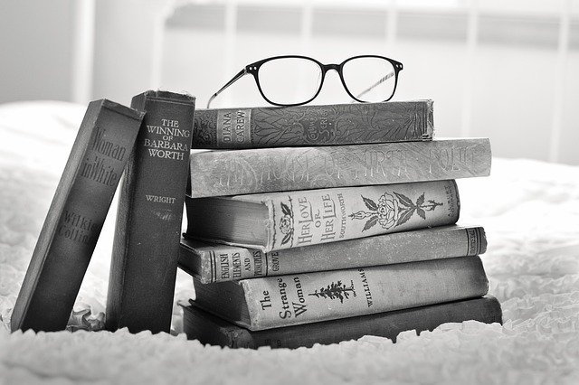 books and reading glasses